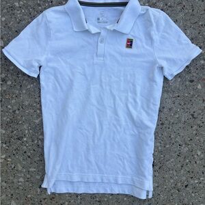 Nike White Kids Polo with Small Multicolor Crest